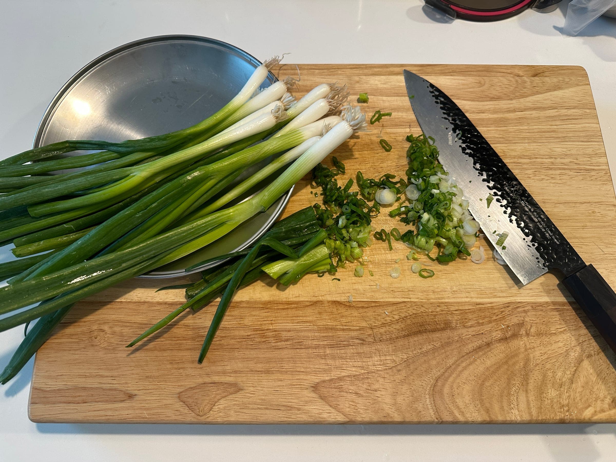 Fresh green onions, ready to mince